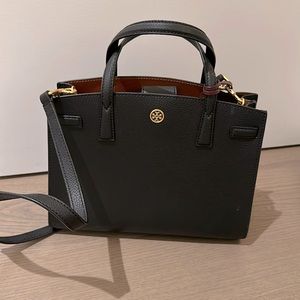 Tory Burch small tote bag. The bag is black with a rich brown interior.